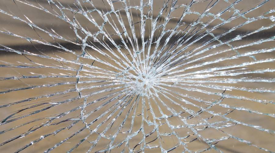 window glass repair near me Brisbane technician fixing crack