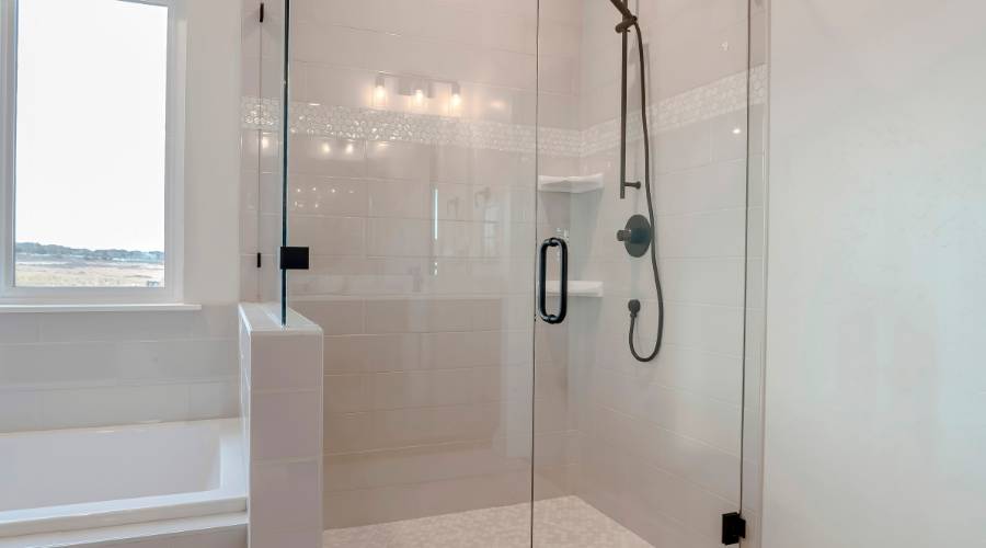 crystal shower glass installation showing pristine frameless screen in contemporary Brisbane bathroom