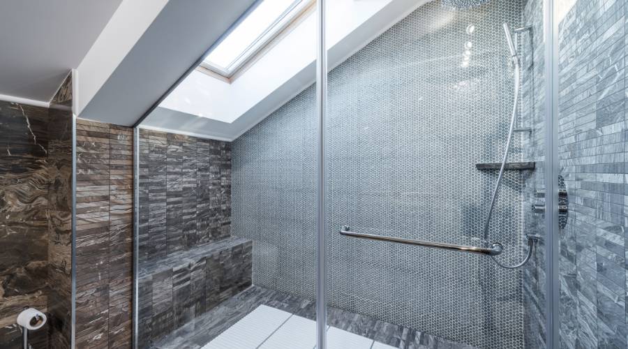 completed crystal shower glass installation showing pristine frameless screen in luxury Brisbane bathroom