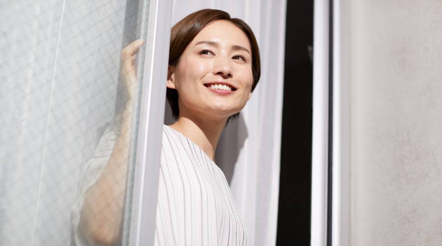 satisfied Browns Plains customer with local glazier after successful glass repair completion in Logan area